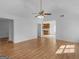 Open concept living space showcasing hardwood floors and plenty of natural light at 150 Grove Creek Dr, Locust Grove, GA 30248