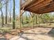 Spacious covered patio beneath deck, perfect for outdoor entertaining at 150 Grove Creek Dr, Locust Grove, GA 30248