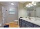 Bathroom featuring a vanity with sink and a shower with marble shower curtain at 317 Lucan Way, Riverdale, GA 30274