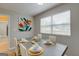 Cozy dining room featuring modern table setting and artful decor at 317 Lucan Way, Riverdale, GA 30274