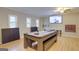 Spacious game room with a pool table, ping pong table, TV, and entertainment options at 317 Lucan Way, Riverdale, GA 30274