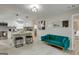 Open concept living space with kitchen, dining area, and fireplace at 317 Lucan Way, Riverdale, GA 30274