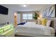 Cozy main bedroom with a large bed, accent pillows, and ample natural light at 317 Lucan Way, Riverdale, GA 30274