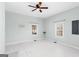 Spacious bedroom with light blue walls, white trim, and neutral-colored flooring for a peaceful retreat at 1616 Park Ne St, Conyers, GA 30012