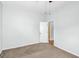 Bedroom features neutral carpet, light walls and a closet at 1616 Park Ne St, Conyers, GA 30012