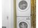 Convenient laundry room features stacked washer and dryer units at 1616 Park Ne St, Conyers, GA 30012