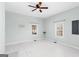 Spacious living room with bright white painted wood floors at 1616 Park Ne St, Conyers, GA 30012