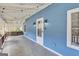 Inviting porch with string lights, outdoor lights and swing at 1616 Park Ne St, Conyers, GA 30012