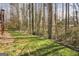 Expansive backyard with lush greenery, ideal for outdoor activities and enjoying nature at 3867 Summer Kitchen Way, Lilburn, GA 30047