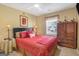 Comfortable bedroom with ceiling fan and good natural light at 3867 Summer Kitchen Way, Lilburn, GA 30047