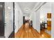 Spacious foyer featuring hardwood floors, white trim, and inviting access to the home's interior at 155 Stayman Park, Fayetteville, GA 30215