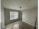 Bedroom with neutral walls and natural light, offering a serene retreat at 133 Dove Lndg, Social Circle, GA 30025