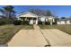 Charming single-story home with a well-manicured front yard and inviting entrance at 133 Dove Lndg, Social Circle, GA 30025