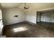 Bright living room featuring a vaulted ceiling and a ceiling fan at 133 Dove Lndg, Social Circle, GA 30025