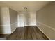 Bright and airy living room space boasting a sleek ceiling light at 133 Dove Lndg, Social Circle, GA 30025