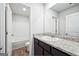 Bathroom featuring a granite countertop, single vanity, and a combined shower and bathtub at 106 Cowpen Ct, Walnut Grove, GA 30052