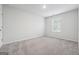 Neutral bedroom with natural light and neutral carpet at 604 Clark Lake Estates Dr, Grayson, GA 30017