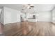 Open-concept kitchen with white cabinets, stainless steel appliances, and a large island with seating at 604 Clark Lake Estates Dr, Grayson, GA 30017