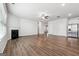 Open concept kitchen with a large island, stainless appliances, and white cabinets overlooking the Gathering room at 604 Clark Lake Estates Dr, Grayson, GA 30017