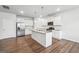 Gourmet kitchen with granite countertops, stainless steel appliances, and an island perfect for entertaining at 604 Clark Lake Estates Dr, Grayson, GA 30017