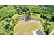 Aerial view of the pond and the home at 10 Last St, Moreland, GA 30259