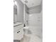 Bathroom features a granite-topped vanity, white cabinets, and tub-shower combination at 10 Last St, Moreland, GA 30259