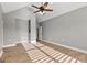 Bonus room with vaulted ceilings, light gray walls, and wood-look flooring at 10 Last St, Moreland, GA 30259