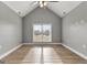 Bonus room featuring vaulted ceiling and a large window that provides natural light at 10 Last St, Moreland, GA 30259