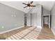Bonus room with vaulted ceilings, light gray walls, and durable wood-look flooring at 10 Last St, Moreland, GA 30259