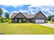 Craftsman home with a two-car garage and covered front porch at 10 Last St, Moreland, GA 30259