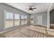 Open living room with hardwood floors, recessed lighting, and bright natural light at 10 Last St, Moreland, GA 30259