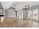 Spacious open-concept living room features vaulted ceilings and modern lighting at 10 Last St, Moreland, GA 30259