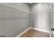 Walk-in closet featuring metal shelving, providing efficient and accessible storage space at 10 Last St, Moreland, GA 30259