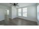 Bedroom featuring two bright windows and a closet at 1269 Snapping Shoals Rd, Mcdonough, GA 30252