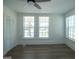 Bedroom features two bright windows and a closet at 1269 Snapping Shoals Rd, Mcdonough, GA 30252