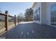 Spacious deck with decorative railing, perfect for enjoying the outdoors and scenic views at 1269 Snapping Shoals Rd, Mcdonough, GA 30252