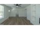 Open-concept living area filled with natural light, highlighting the modern ceiling fan at 1269 Snapping Shoals Rd, Mcdonough, GA 30252
