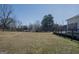 Expansive yard with deck offering ample outdoor space and potential at 1269 Snapping Shoals Rd, Mcdonough, GA 30252