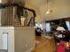 Open living room with hardwood floors, cathedral ceilings, and a cozy stone fireplace at 306 Oakwind Way, Canton, GA 30114