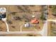 Aerial view of the roof, yard, and the surrounding homes at 5700 Mount Zion Rd, Waco, GA 30182