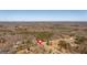 High aerial view showcasing property and lake nearby at 5700 Mount Zion Rd, Waco, GA 30182