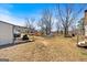 Expansive backyard featuring a covered car-port, swing set, and play area, perfect for outdoor activities and relaxation at 5700 Mount Zion Rd, Waco, GA 30182