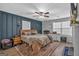 Comfortable main bedroom features a decorative rug, side tables, and bright natural light at 5700 Mount Zion Rd, Waco, GA 30182