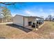 Versatile outbuilding with covered parking, ideal for storing vehicles, equipment, or creating a workshop space at 5700 Mount Zion Rd, Waco, GA 30182