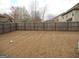 Large, fenced backyard offering plenty of space for outdoor activities at 620 Calvo Run, Mcdonough, GA 30253