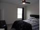 Bedroom with a cozy bed, window, and television set at 620 Calvo Run, Mcdonough, GA 30253