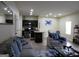 Open concept living room that leads to the kitchen and dining area at 620 Calvo Run, Mcdonough, GA 30253