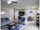 Open concept living room that leads to the kitchen and dining area at 620 Calvo Run, Mcdonough, GA 30253