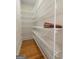 Walk-in pantry offers ample storage on wire shelves and wood flooring at 340 Antebellum Way, Fayetteville, GA 30215