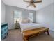 Bedroom with neutral walls, plush carpet and ceiling fan at 407 Holly Grove Church Rd, Peachtree City, GA 30269